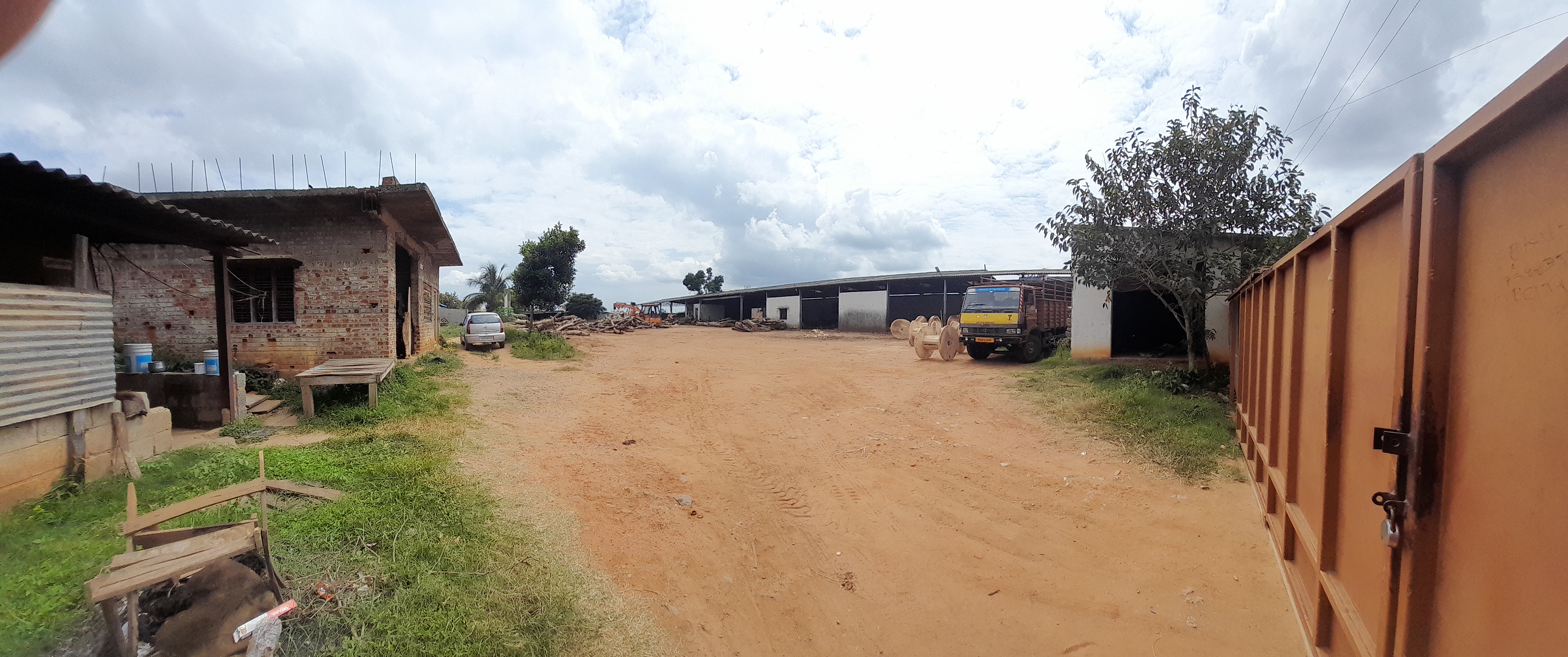 Wide angle view of Kudur Timbers Saw Mill's outer facility